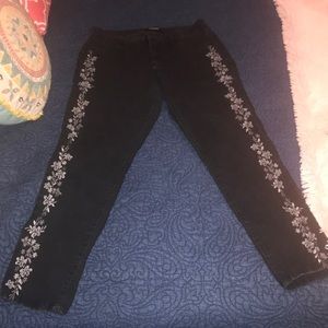 Black jeggings with gray flowers down the sides